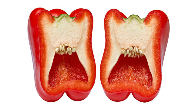 Two symmetrical halves of a fresh vibrant red bell pepper with seeds