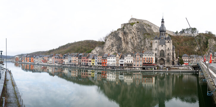 Dinant, Belgium, January 2, 2026: Dinant town reflecting in meuse river belgium