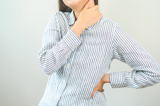 Pain body muscles stiff problem, asian young woman, girl painful with back, neck ache from work hand holding massaging rubbing shoulder hurt, sore on white background. Health care and medicine concept