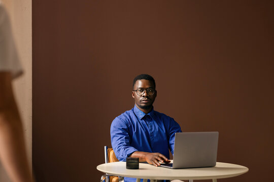 Businessman Working at a Laptop