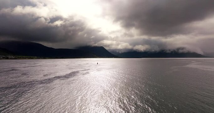 Sunset Coastal Waters, Island Destinations, Cloudy Weather, Rippling Surface Waters, Norwegian Landscapes, Cinematic Aerial View
