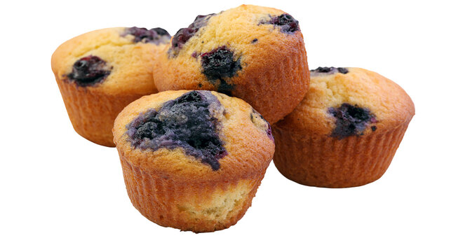 Freshly baked golden brown blueberry muffins with visible fruit pieces
