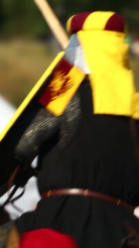 A man in a knight costume riding a horse, perfect for medieval-themed events or fantasy illustrations