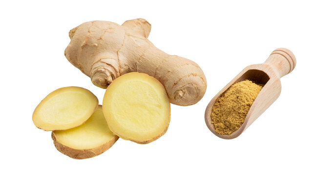 Fresh ginger root with sliced pieces and ground powder in a wooden scoop