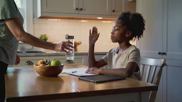 Raising hand girl asking for water kitchen as parent entering offering bottle by tablet, copy space