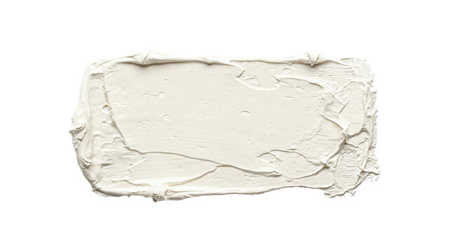 Thick white cosmetic cream texture stroke with realistic palette knife marks spread evenly across a flat clean plain on transparent background