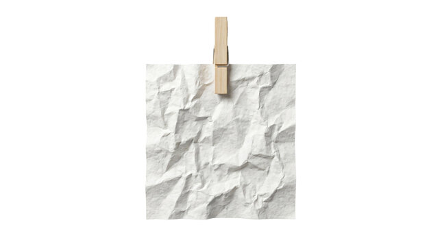 Wrinkled square white paper sheet held by a wooden clothespin clip hanging isolated in bright light on transparent background