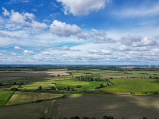 Fototapeta premium Aerial drone view of agricultural fields and railway line near Wustermark Brandenburg Germany