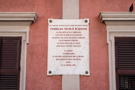 Commemorative plaque to poet and scholar Tommaso Nicolo d'Aquino in Via Tommaso d'Aquino, historic center of Taranto, Puglia, Italy