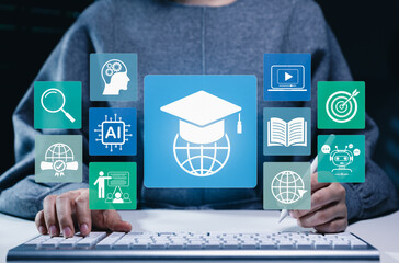 Online Education and E-Learning Technology Concept. Student using computer for online education with learning tools icons, graduation cap, AI, books, global connectivity, study platform, learn virtual © Sandwish
