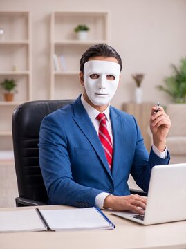 Masked Business Professional Working at an Office Desk