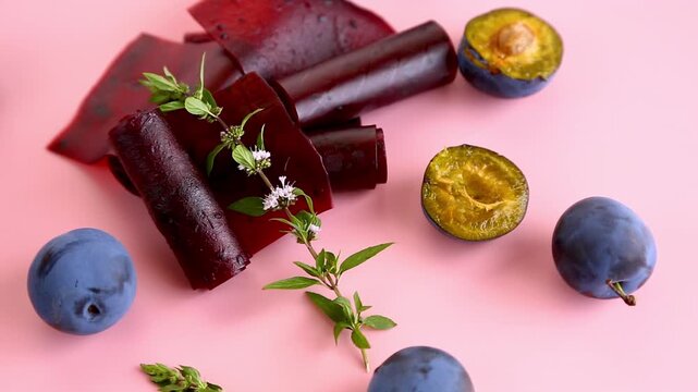 Sweet plum pastila rolls with mint