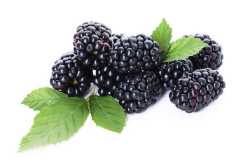 Pile of ripe blackberries and leaves isolated on white © New Africa