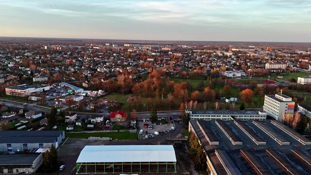 Aerial view of industrial buildings and urban landscape in Jelgava, Latvia.
