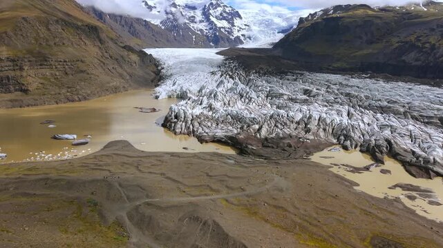 Stunning aerial perspective showing the Svinafellsjokull glacier, part of the Vatnajokull ice cap, with its glacial lake and moraine