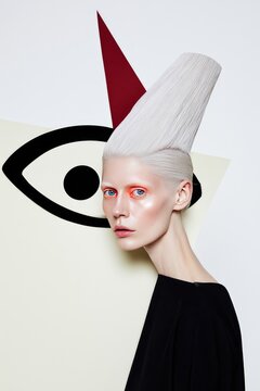 Futuristic Fashion Portrait with Geometric Elements and Avant-Garde Hair Design