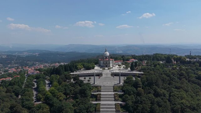 Aerial - Sameiro Sanctuary in Braga seen along the monumental stairway with hills beyond