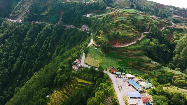Drone orbits right through cloud revealing Halsema Highroad Second Highest Point