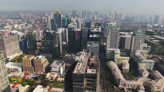 Right aerial turn exposes vast urban density, high-rises across BGC, Philippines