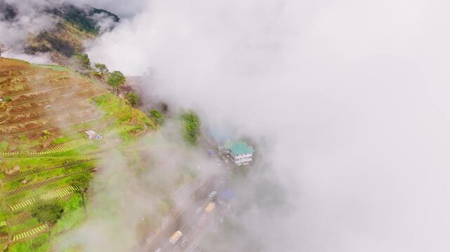 Drone descends at Halsema Highroad Point until a dense cloud obscures the camera