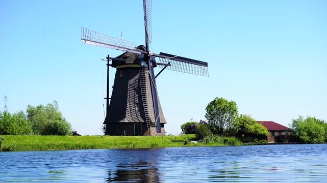 traditional dutch windmills row in Kinderdijk at summer day, Netherland