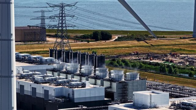Aerial view of the Google Data Center facility featuring cooling towers and power infrastructure in Eemshaven, Groningen, Netherlands.