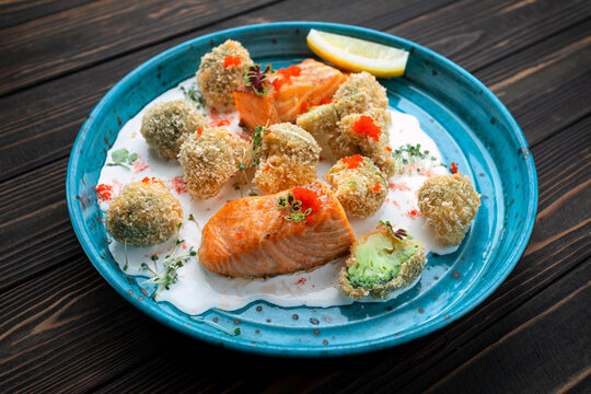 Grilled salmon with breaded broccoli balls