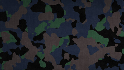 Blue, green, and gray camouflage pattern on fabric military army © MehediHasan
