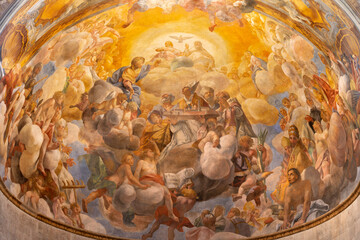 Naklejka premium Lucca - The painting of The Glory of the Holy Trinity among the saints in the church Cattedrale di San Martino by Giovanni Coli and Filippo Gherardi (1681)