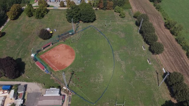 Aerial view of a baseball field with players during a game in Cornaredo near Milan, Italy. Suitable for sports, recreation, local events and editorial content.