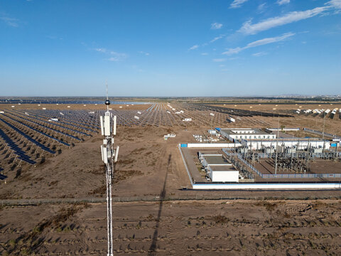Large scale photovoltaic power station in desert area under blue sky