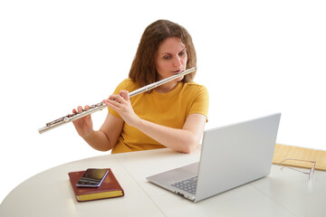 Woman flutist playing musical instrument during online lesson on laptop. Student learning music via video call at home. Musician practice remotely. Education concept on transparent background. © Андрей Журавлев
