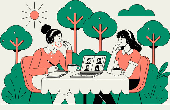 Two women wearing headphones having an outdoor video call at a cafe table with laptop, coffee and notebook surrounded by green trees