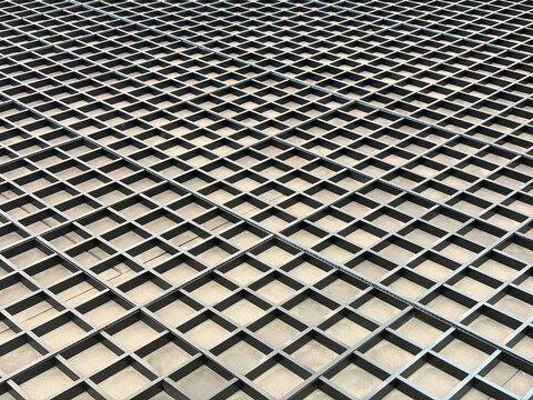 Geometric pattern of diamonds and square in perspective.