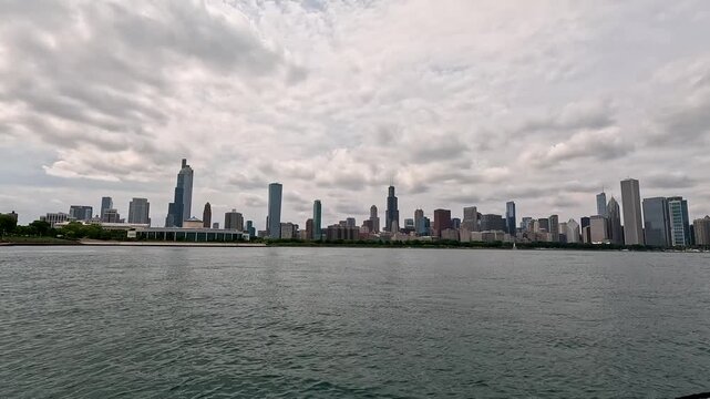 Footage of skyscrapers and office buildings along Lake Michigan in Chicago Illinois USA