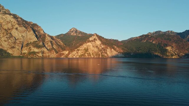 Aerial view of Mount Traunstein and mountain range reflection Lake Traunsee