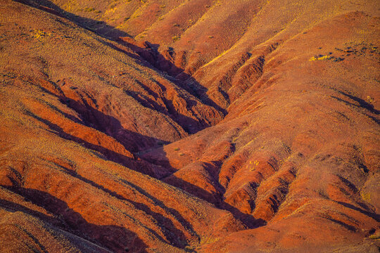 Red colorful mountains in Altai, Siberia, Russia. Kyzyl-Chin valley at sunset. Aerial top down view