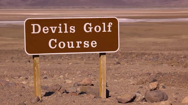 Long lens shot of devils golf course sign