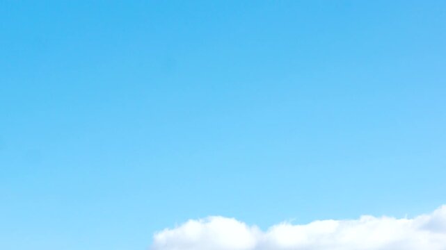 blue sky with light white clouds