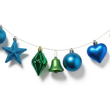 A festive string of blue and green Christmas ornaments on white background