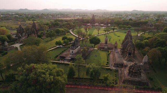 Aerial view of the famous khajuraho group of monuments, a unesco world heritage site in madhya pradesh, india, during sunset