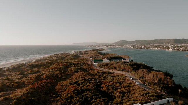 Aerial - Ofir peninsula with dune scrub beach estuary and Esposende hills in Portugal