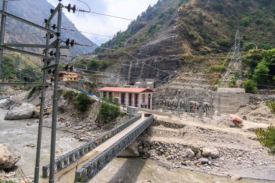 Syabrubesi village in the Langtang region, Nepal. Bridge over the Trushuli river with a power plant in the background, photo taken April 2026