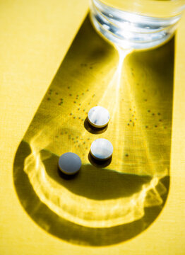 taking pills vitamins or supplements conceptual image