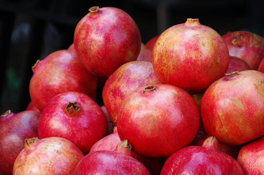 pomegranate fruit on a dark background