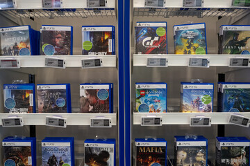Obraz premium View of PlayStation 5 video games on retail shelves. Toronto, Canada - August 5, 2026.