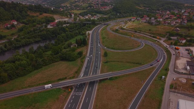 Wide Aerial View of Highway A1 Interchange Loop and Surrounding Landscape Near Vogosca Bosnia and Herzegovina