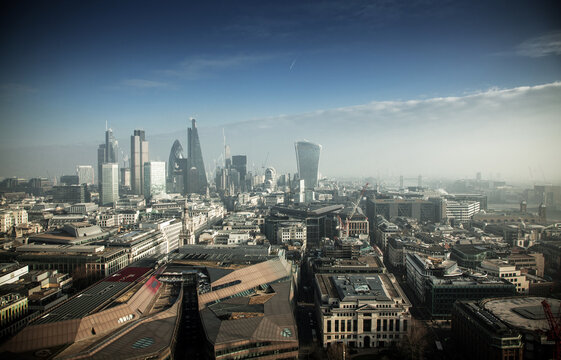 rooftop view over London on a foggy day from St Paul's cathedral, UK