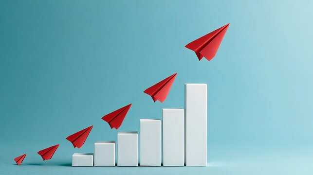 Red paper airplanes flying upward along a rising growth bar chart representing business success and strategy with paper airplane strategic planning financial growth