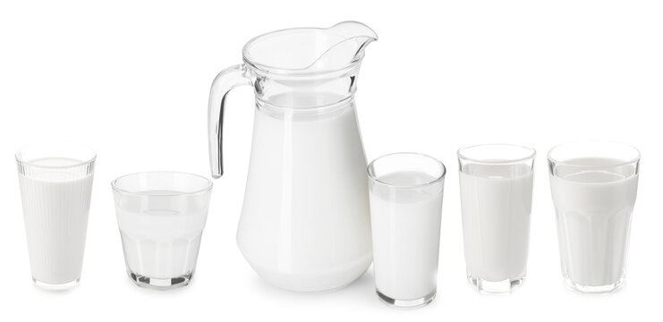 Fresh milk in glasses and jug isolated on white, set
